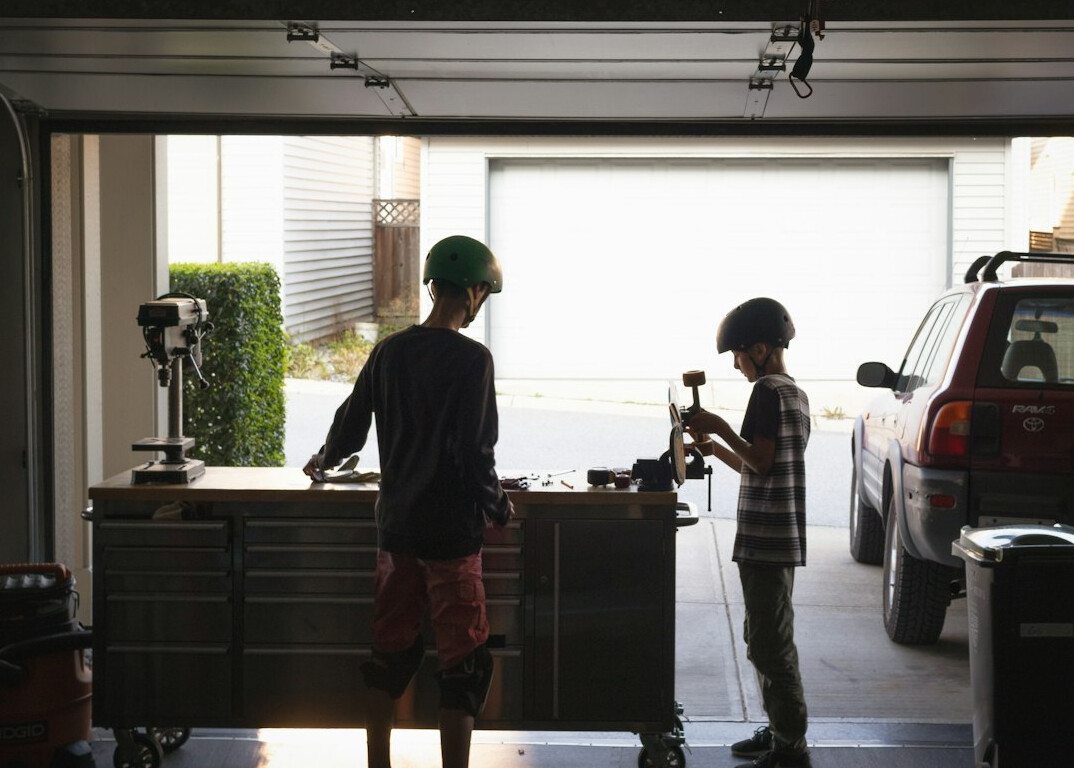 Organised garage workbench with car repair tools